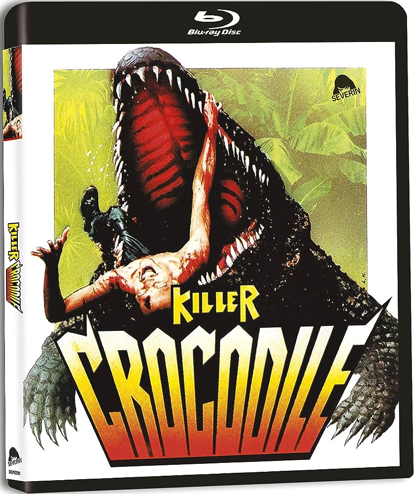 The Blu-Ray cover of the Severin release of Killer Crocodile (1989) featuring a gigantic crocodile savagely devouring a person.